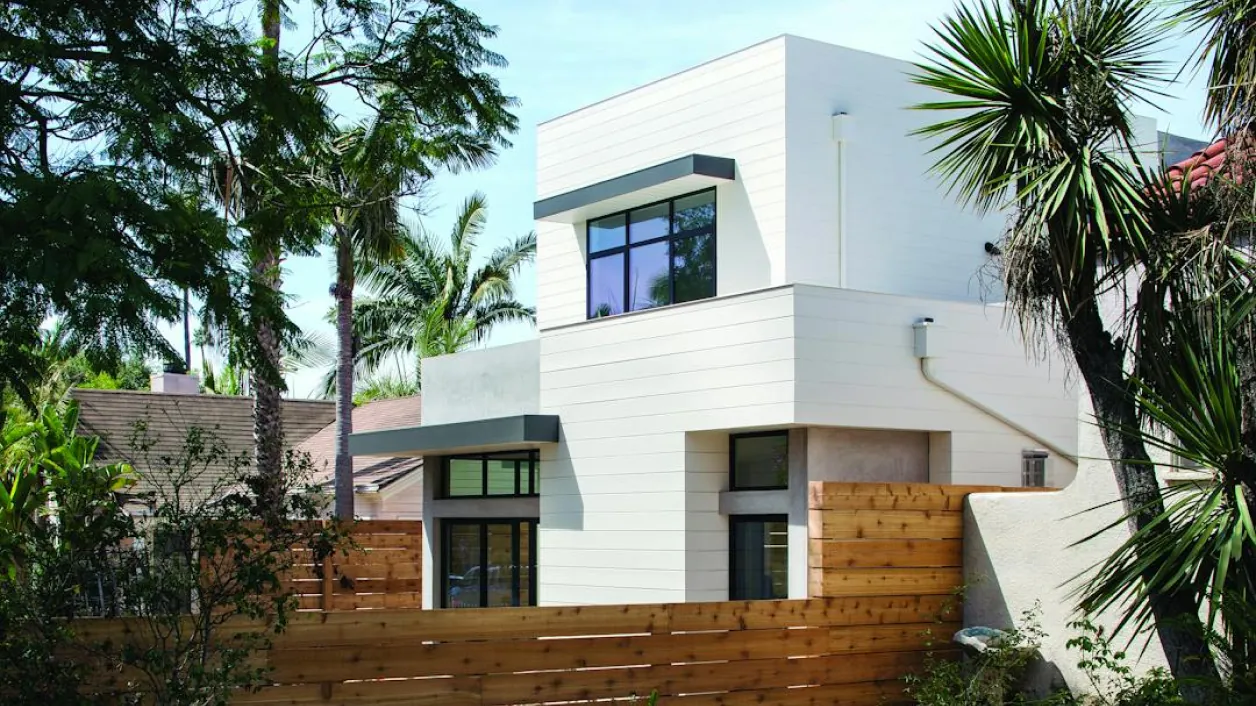 Modern home with Hardie Artisan V-Groove siding in rustic white