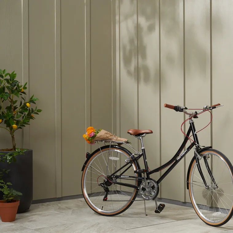 Hardie Panel vertical siding installation with batten rhythm