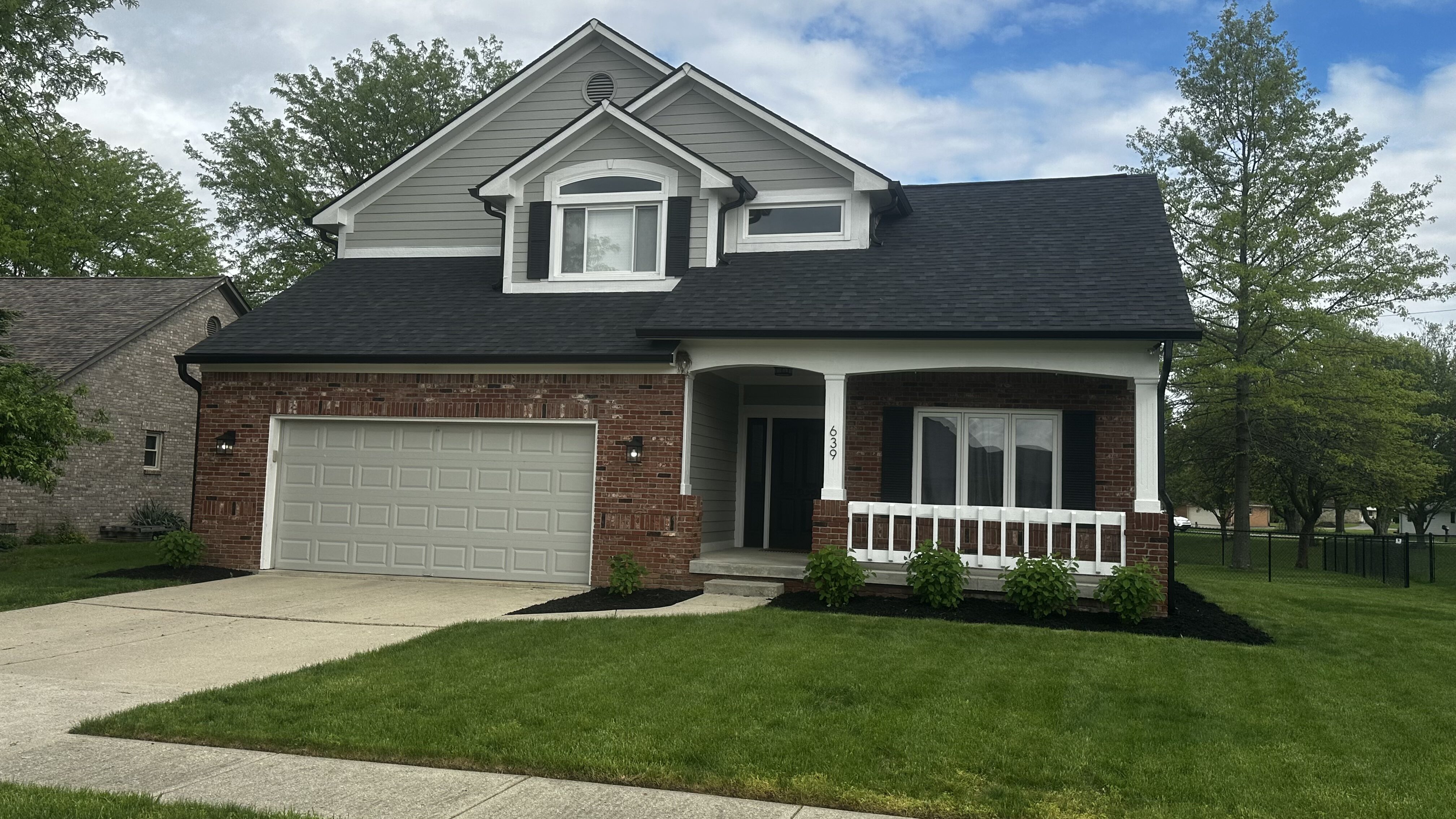 Completed architectural shingle roof on a Central Indiana home