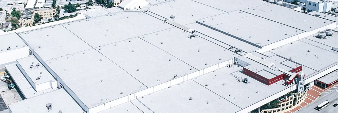 Large low slope commercial roof on an Indiana style business property