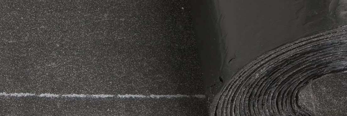 Close-up of modified bitumen APP roof membrane texture