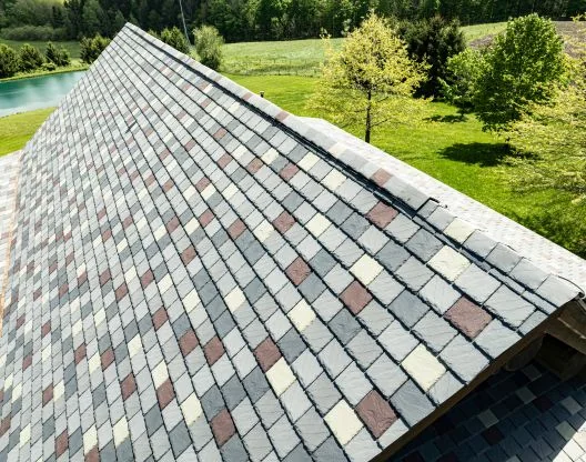Close-up of synthetic slate roofing with varied slate color and texture