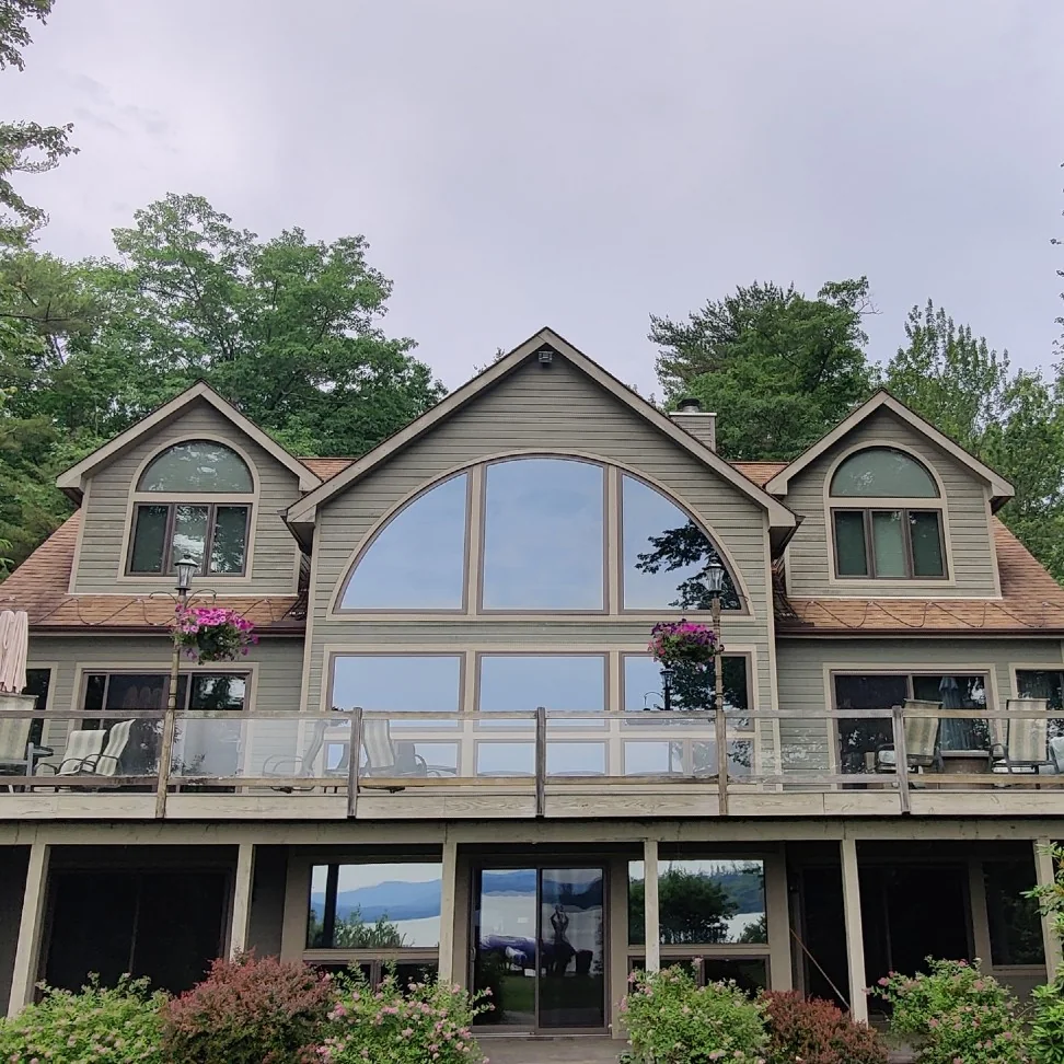 Arched specialty window on a Central Indiana home exterior