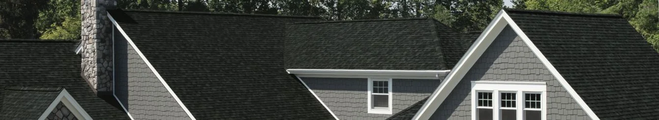 Asphalt shingle color blend on a suburban Midwest home exterior