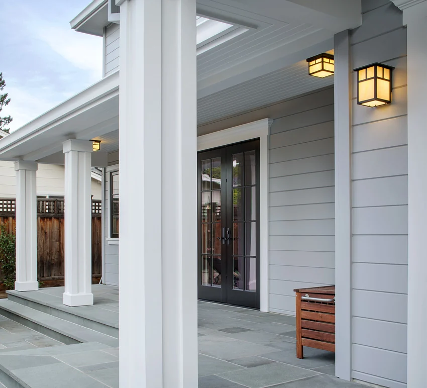 James Hardie siding and trim on a covered porch entry with columns