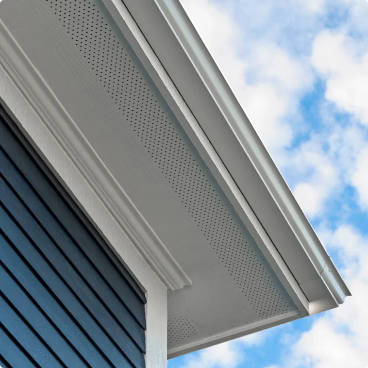 James Hardie soffit and plank siding detail with crisp blue and white exterior contrast