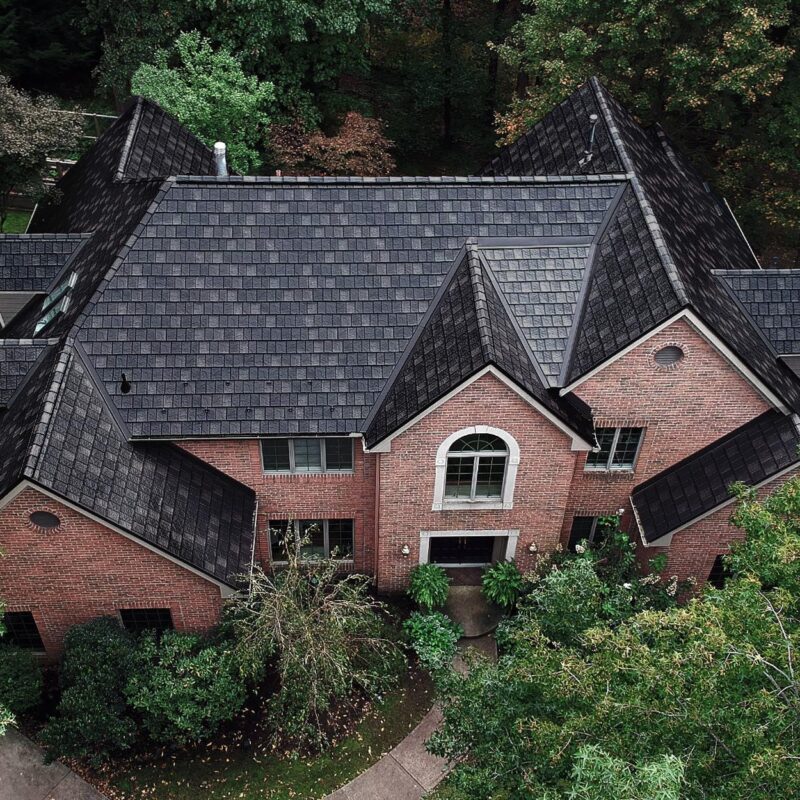 Complex brick home with EDCO ArrowLine steel roofing