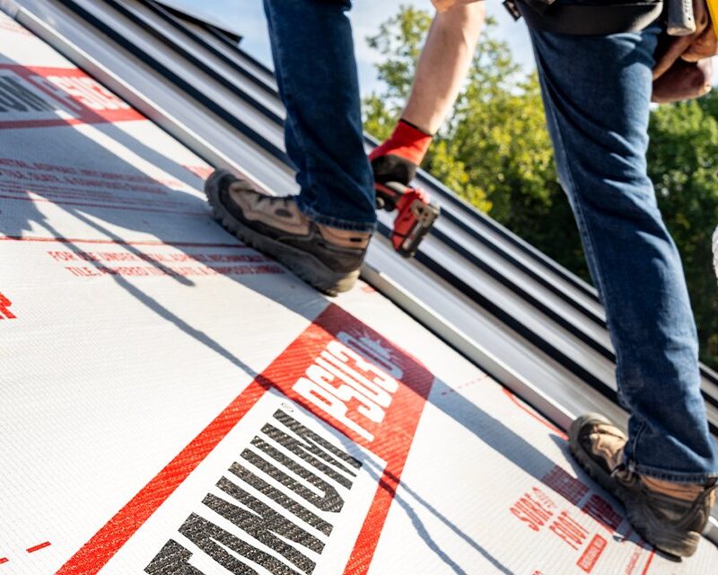 Owens Corning Titanium underlayment exposed beside metal roof panels