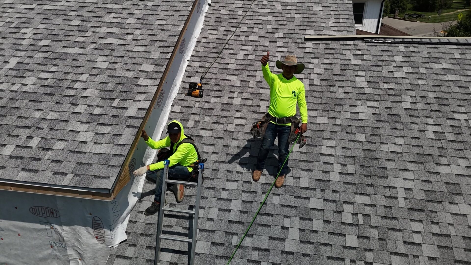Raptor Roofing crew installing shingles on a Central Indiana home.