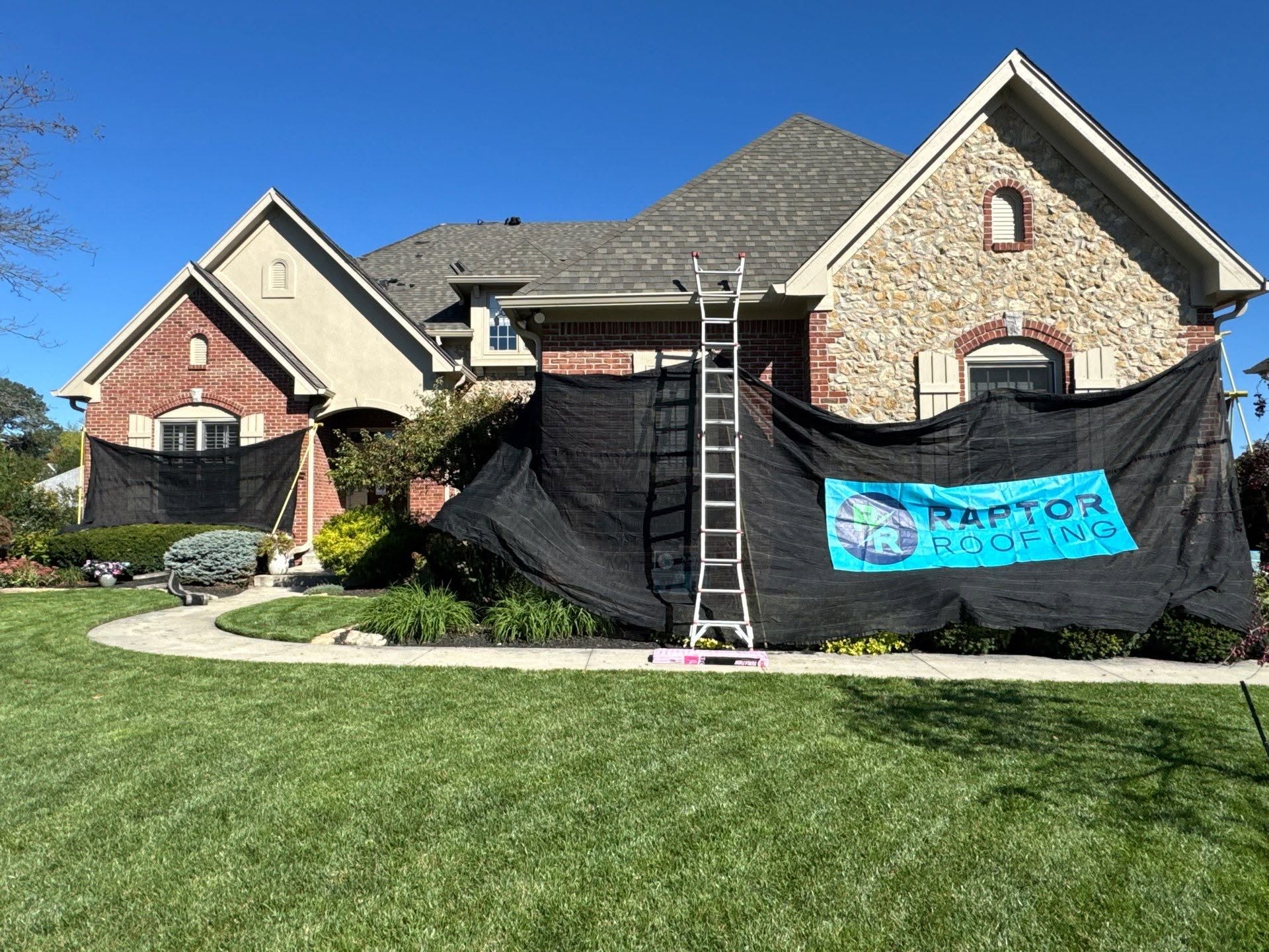 Central Indiana home protected during a residential roofing project by Raptor Roofing.