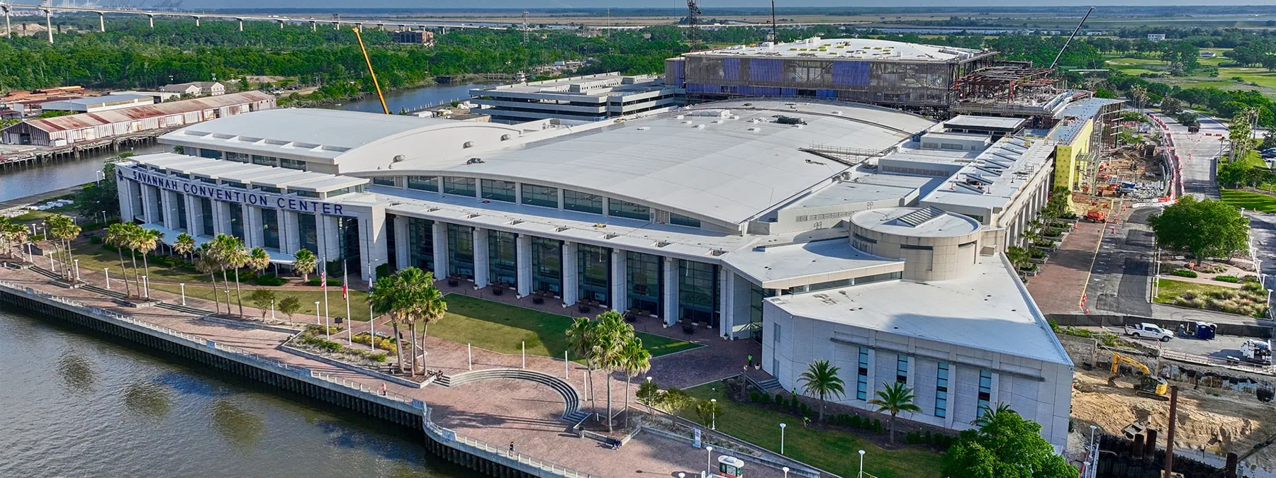 Aerial view of a convention center with a completed PVC roof